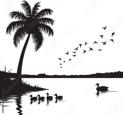 Black silhouette of palm tree and ducks on water with flying birds