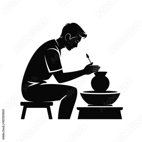 Person shaping clay pot on pottery wheel artisan craftsman