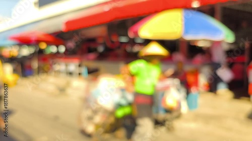 Blurred people' activities in the fresh market, Chiangmai Thailand.	