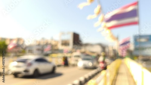 Blurred traffic in during the day, Chiangmai Thailand.	