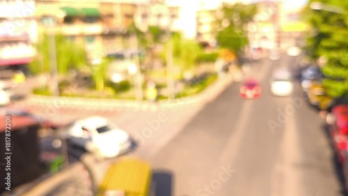 Blurred traffic in during the day, Chiangmai Thailand.	