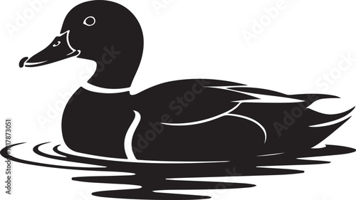 Silhouette of a mallard duck swimming in water with ripples