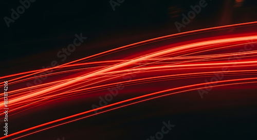 The effect of red light in fast motion on a black background blurred abstract background with long e 36394481 1