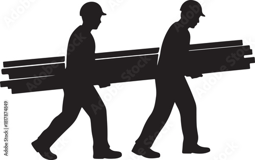 Two construction workers carrying lumber together in silhouette