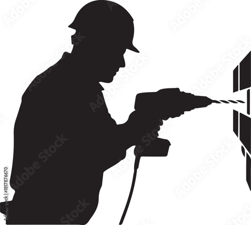 Silhouette of a construction worker drilling a hole in a wall