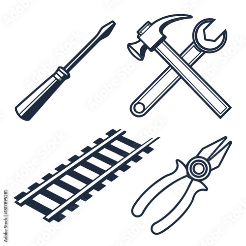 Collection of essential hand tools including a screwdriver, hammer, wrench, and pliers, alongside railroad tracks, isolated on