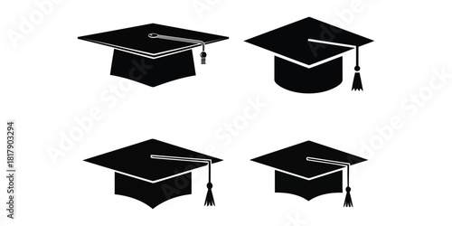 Four black graduation caps with tassels, isolated on