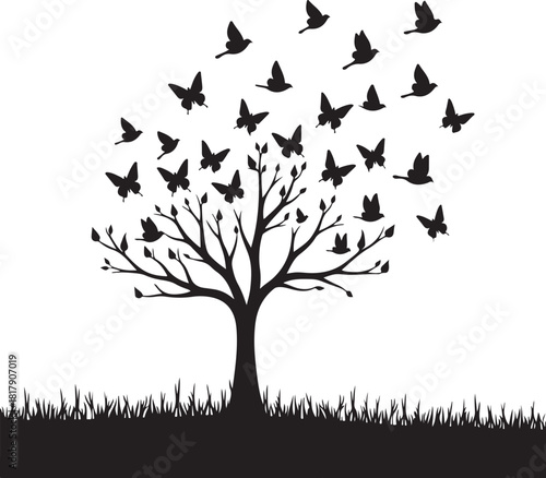 Black silhouette tree with flock of birds and butterflies