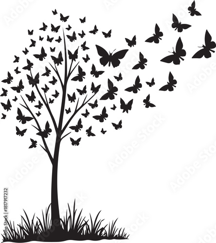 Black tree with many butterflies flying away butterfly