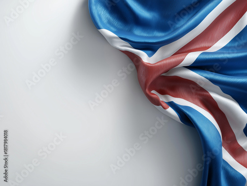 Waving flag of Iceland isolated on white background. Blue, red, and white Nordic cross symbol with silk fabric texture and copy space for text.