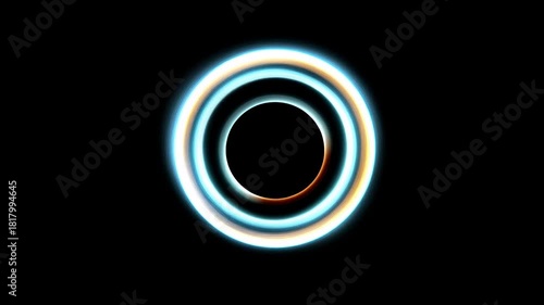 Several glowing circular light rings in different colors form an energetic halo on a black background, creating a sense of pulsation and motion