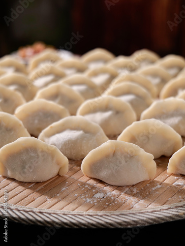 Traditional Handmade Dumplings on Bamboo Steamer - Fresh Asian Cuisine Preparation