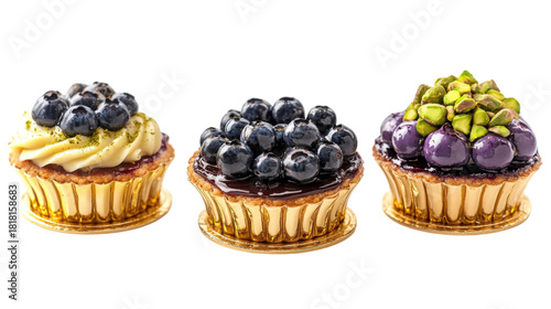 Three fruit tarts with golden wrappers isolated on a transparent background