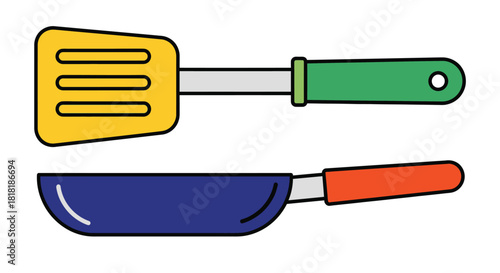 Colorful frying pan and spatula set ready for delicious home cooking