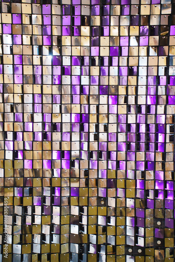 Fototapeta premium Colorful sequined wall decoration in vibrant shades