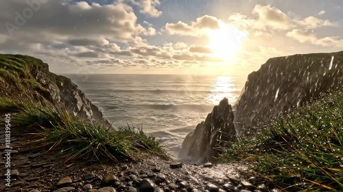 4K resolution vista of rugged cliffs and ocean at sunset with dramatic sunbeams