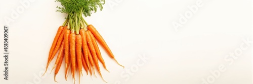 Fresh carrots arranged in a...