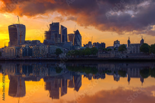 London cityscape over river Thames with a dramatic sunset sky
