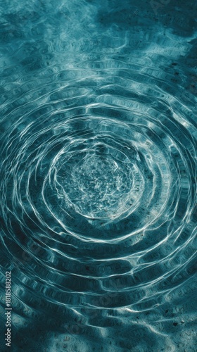 Ripples of Tranquility: Serene image of concentric circles radiating outward from a central point, showcasing the mesmerizing dance of light and shadow on the water's surface.