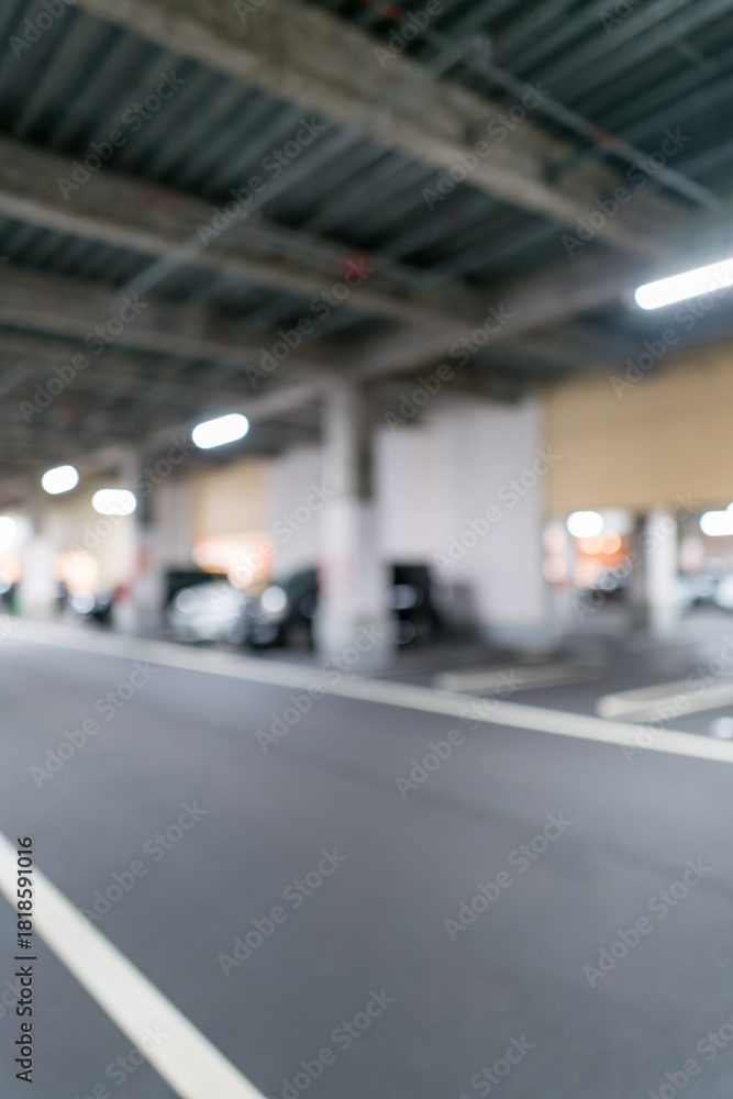 Fototapeta premium 立体駐車場の通路と矢印のぼかし背景素材