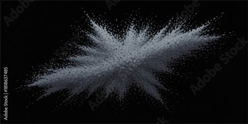 Explosion of gray powder against a black background for creative designs