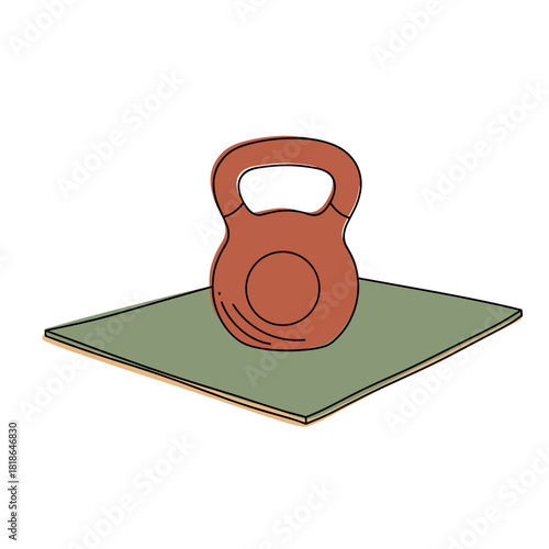 Kettlebell resting on green gym mat for fitness training  
