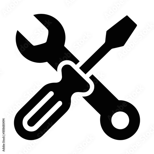 crossed wrench and screwdriver icon representing repair and maintenance tools