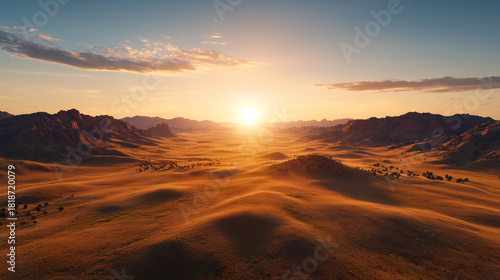 Fototapeta Naklejka Na Ścianę i Meble -  Majestic Sunrise Over Vast Desert Landscape with Rolling Sand Dunes and Stunning Mountain Backdrop