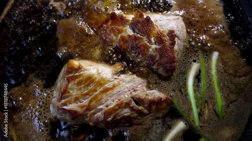 Boiling chopped pork in pot, indoor Chiangmai Thailand.
