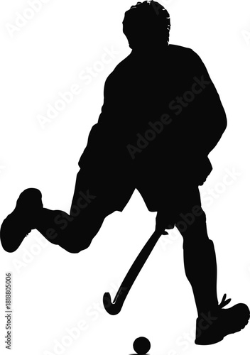 Silhouette of a field hockey player in action on the field, showcasing skill and athleticism