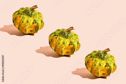 Festive pumpkins on a neutral background for Halloween