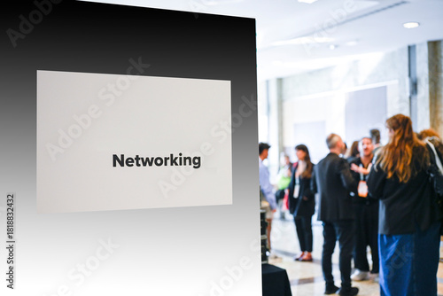 Tableau sur toile Networking Event with Professionals with Networking sign in the foreground