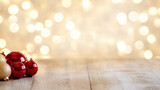 Festive composition of glowing red and gold holiday ornaments on rustic wooden surface with warm bokeh lights creating joyful atmosphere