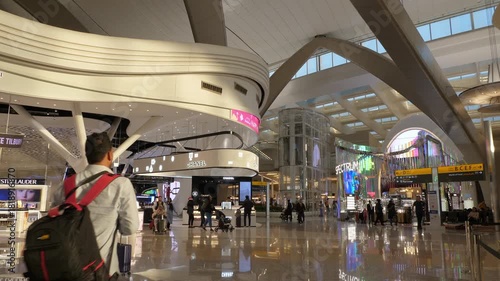 day time new modern abu dhabi international airport duty free zone store slow motion panorama 4k uae