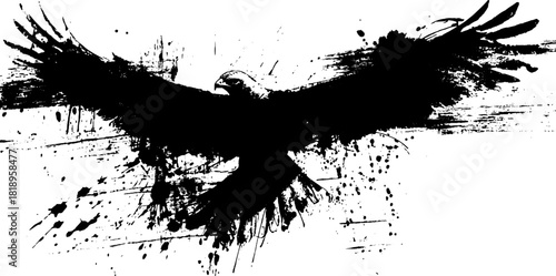 Dynamic hawk in grunge ink splatter silhouette for art and design projects
