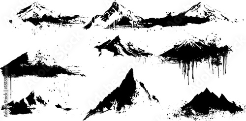 Black ink splatter brush painted mountain illustrations set for artistic design and decoration