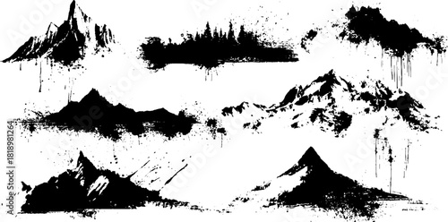 Abstract ink splatter landscape set featuring mountains and grunge brushstrokes for artistic design