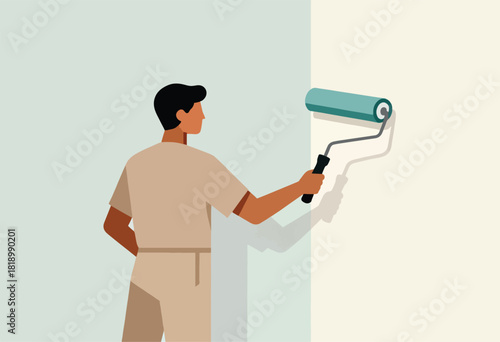 A person with dark hair, in a beige outfit, uses a paint roller on a wall. It has two color tones