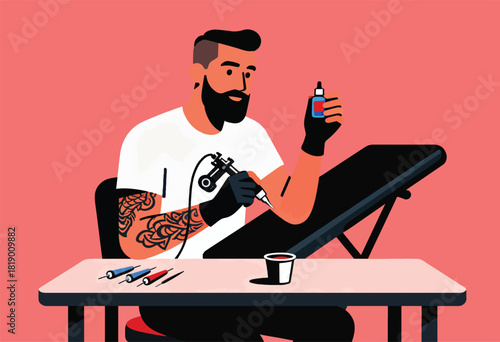 A bearded man with a tattoo, tattoos another, holding ink and a tattoo gun, at work