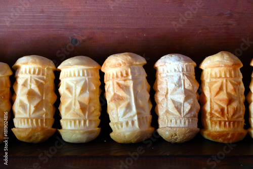 Fototapeta Naklejka Na Ścianę i Meble -  Oscypek cheese, traditional Tatra Mountains product of Poland. Smoked cheese made of salted sheep milk exclusively in the Tatra Mountains region of Poland