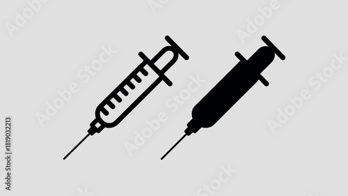 Two stylized medical syringes one outlined and one solid black