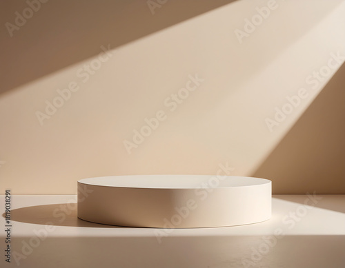 Minimalist beige round podium with soft natural light and shadow, perfect for elegant product display or presentation
