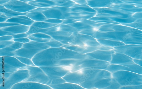 Clear Swimming Pool Water with Sunlight Reflections