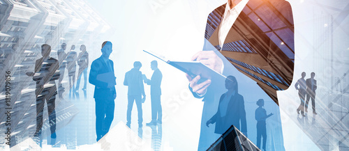 Silhouettes of business people overlaid with modern city buildings in abstract double exposure style on light background, concept of teamwork and strategy