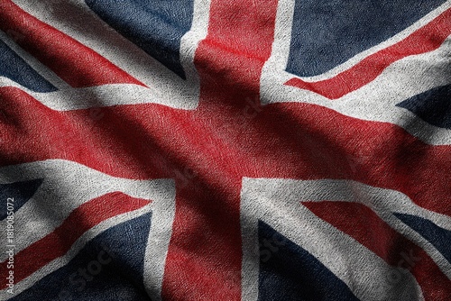 Textured fabric of Union Jack, close-up view, showing blue, red, and white