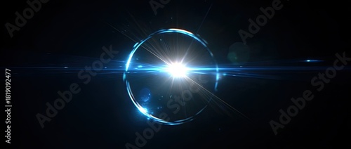 Radiant orb with circular blue outline on a dark backdrop, lens flares abound