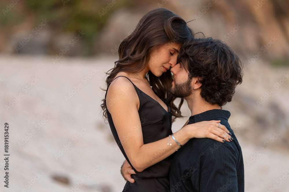 Fototapeta premium Intimate romantic couple hugging and touching foreheads