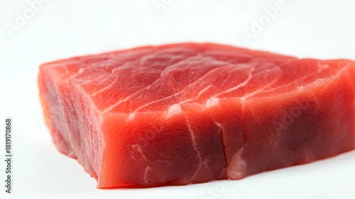 Wallpaper Mural A piece of raw meat lies on a clean white surface, ideal for use in still life  or as a prop in food or medical related productions Torontodigital.ca