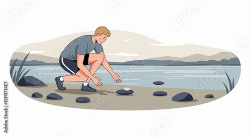 Young man crouches by a serene lakeside, carefully placing flat stones, enjoying a peaceful outdoor activity amidst nature with mountains in the background.
