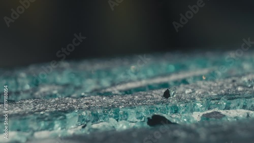 Vibrating Glass Shards on Sheet Surface